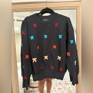Anthropologie Black Sweater with Colorful Bow Accents